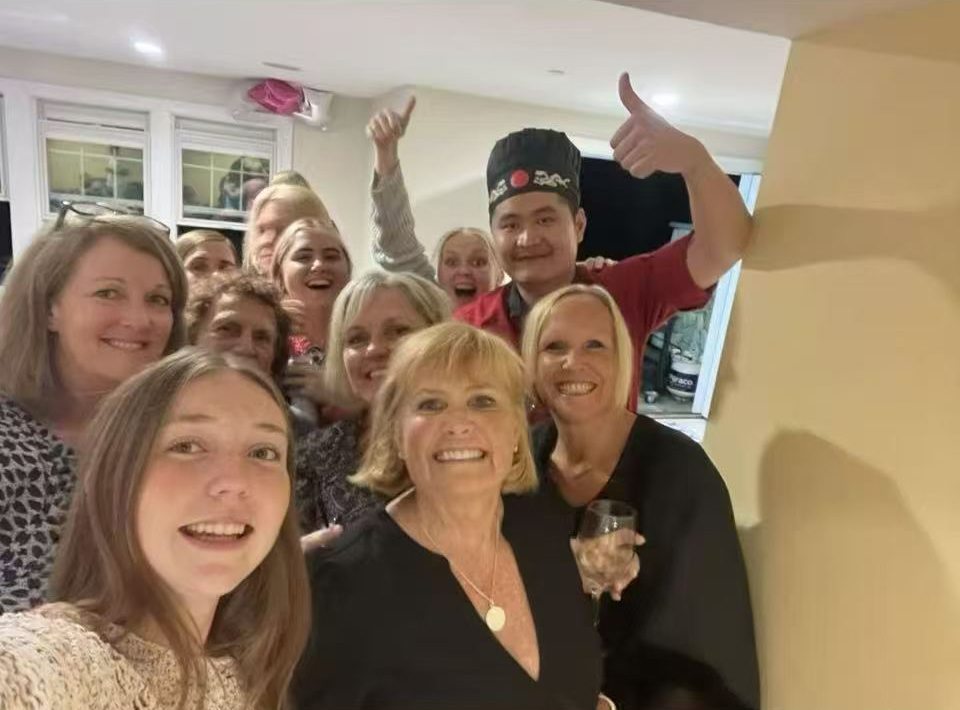 Guests enjoying a Go For Hibachi backyard party