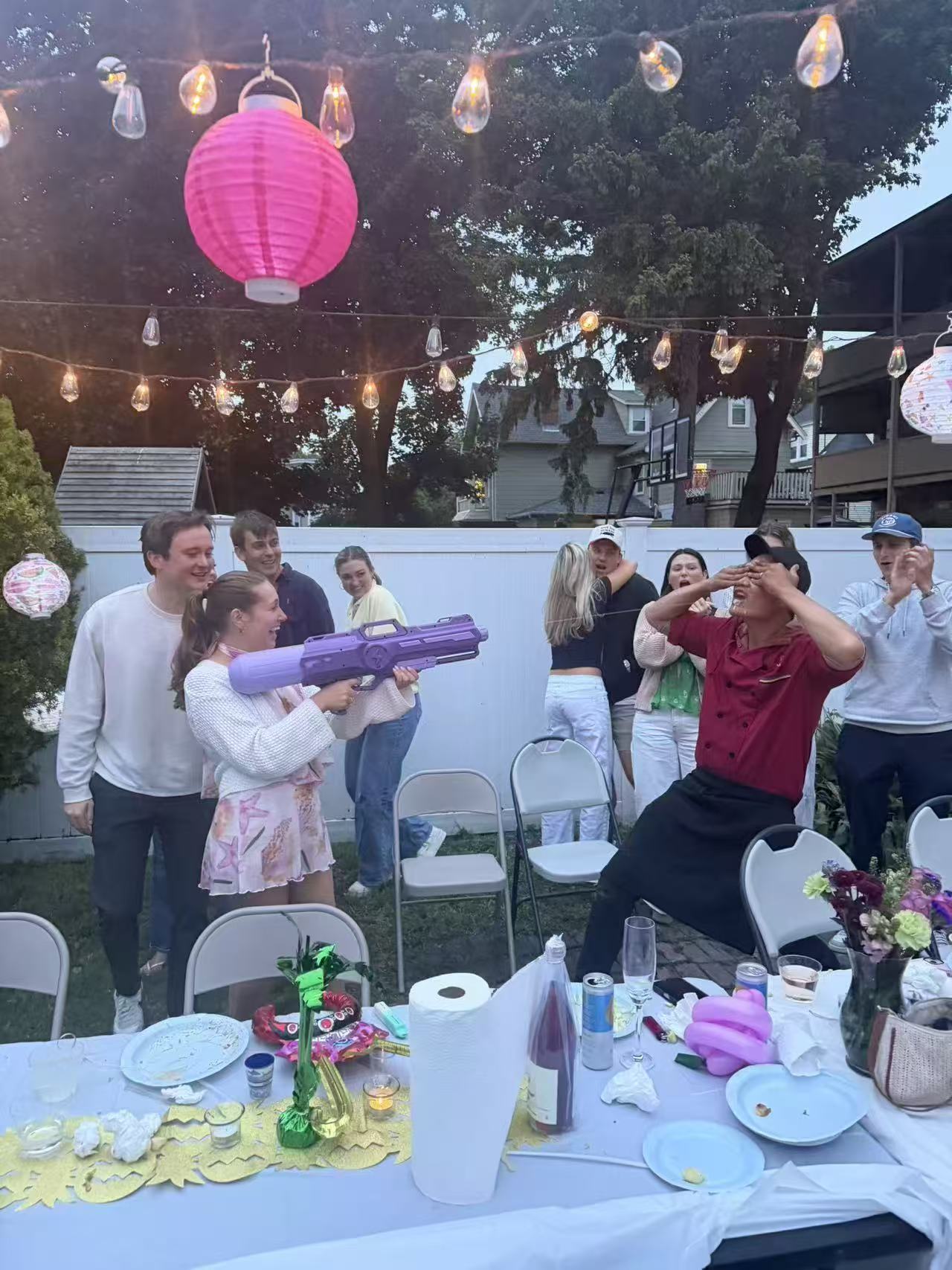 Family gathering enjoying a Go For Hibachi backyard dinner