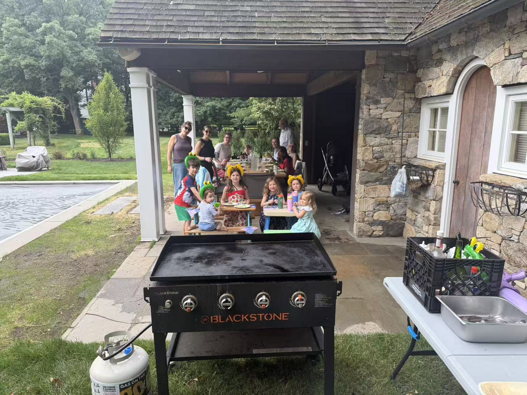 Private chef cooking hibachi at a backyard event