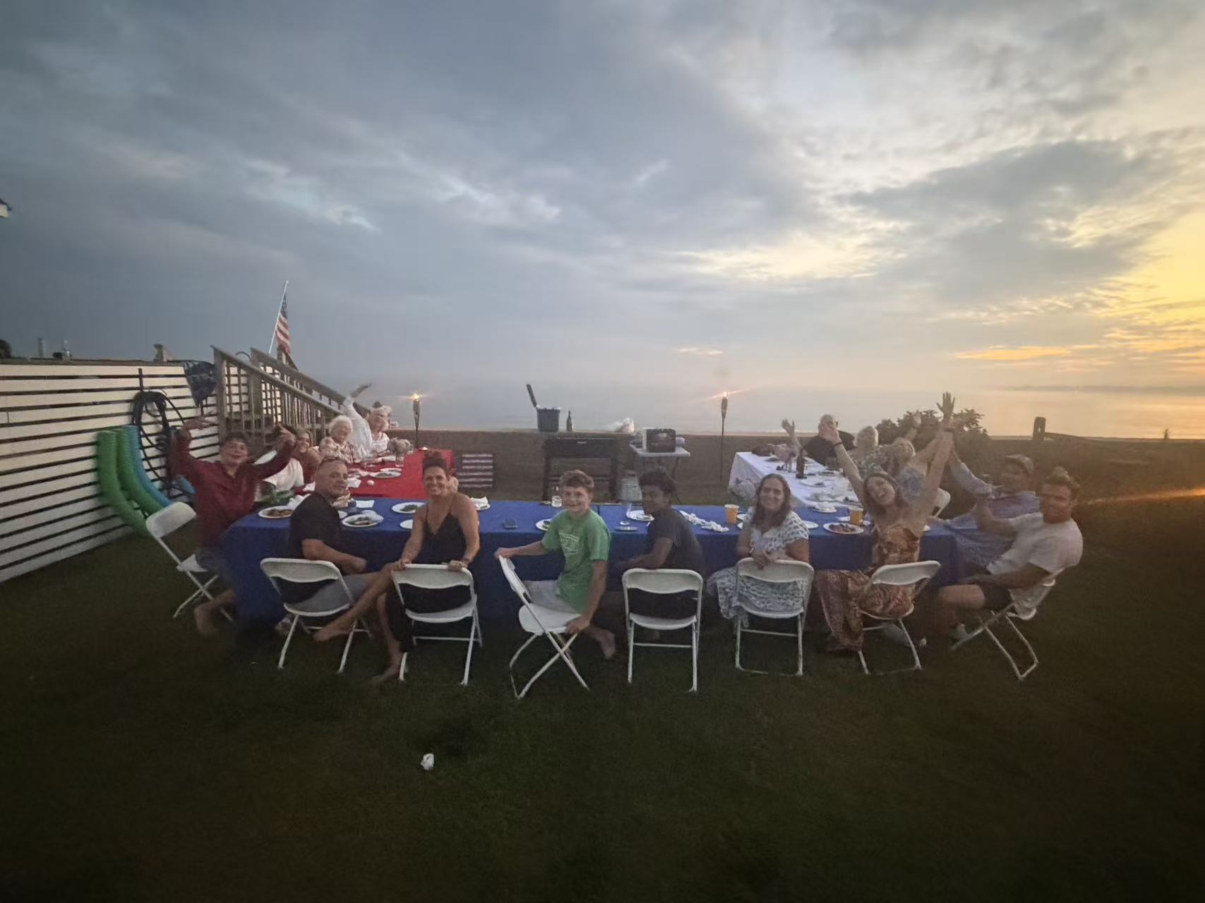 Backyard hibachi party guests around the table